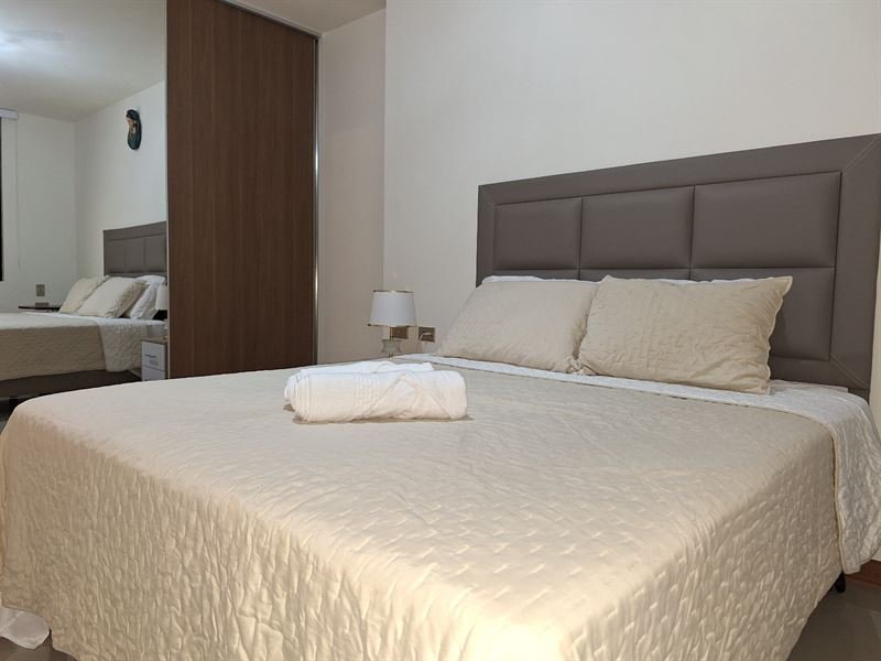 Suite principal del departamento 2D Familiar y Moderno
